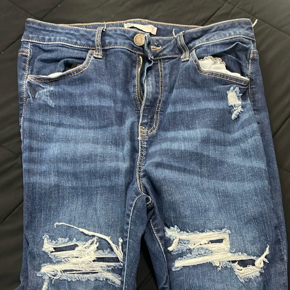 Blue ripped jeans
